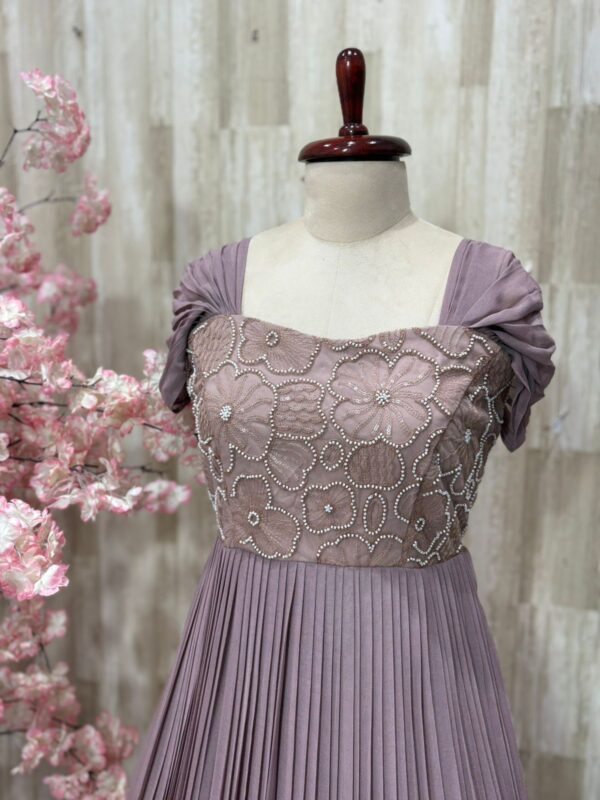 Georgette long gown with heavy flare & floral bead work on yoke part