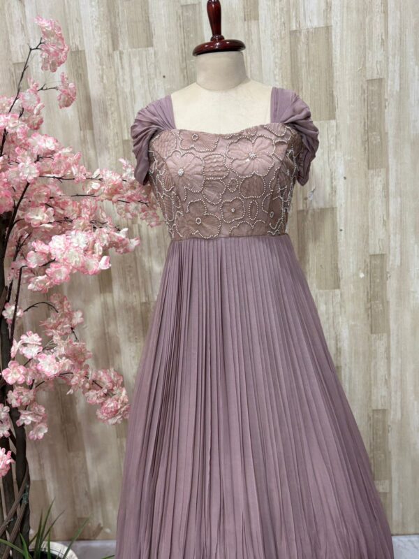 Georgette long gown with heavy flare & floral bead work on yoke part