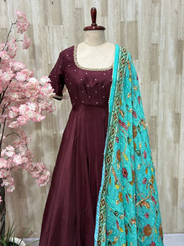 Crepe long gown with maggam work on neck & sleeves paired with kalamkari dupatta