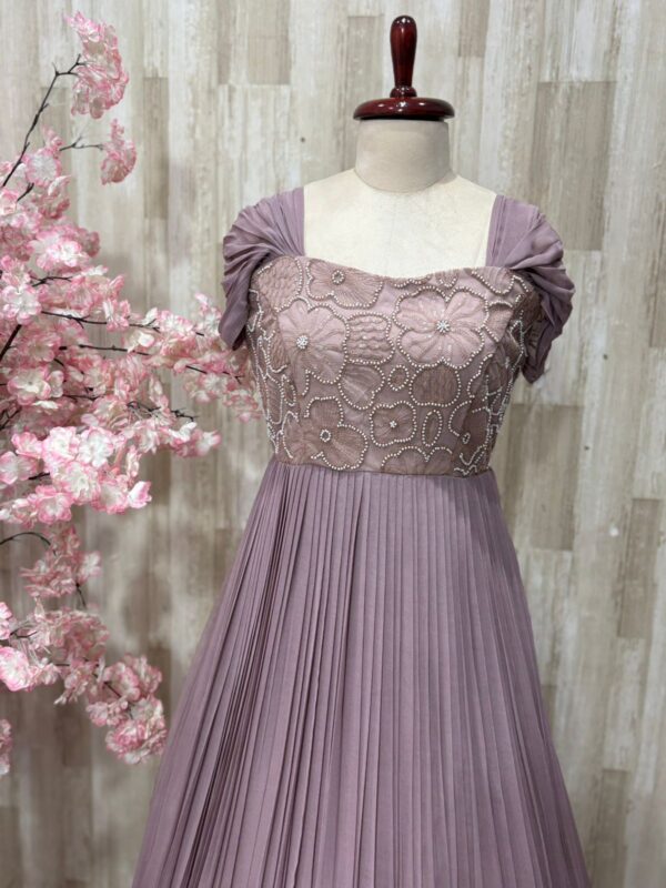 Georgette long gown with heavy flare & floral bead work on yoke part