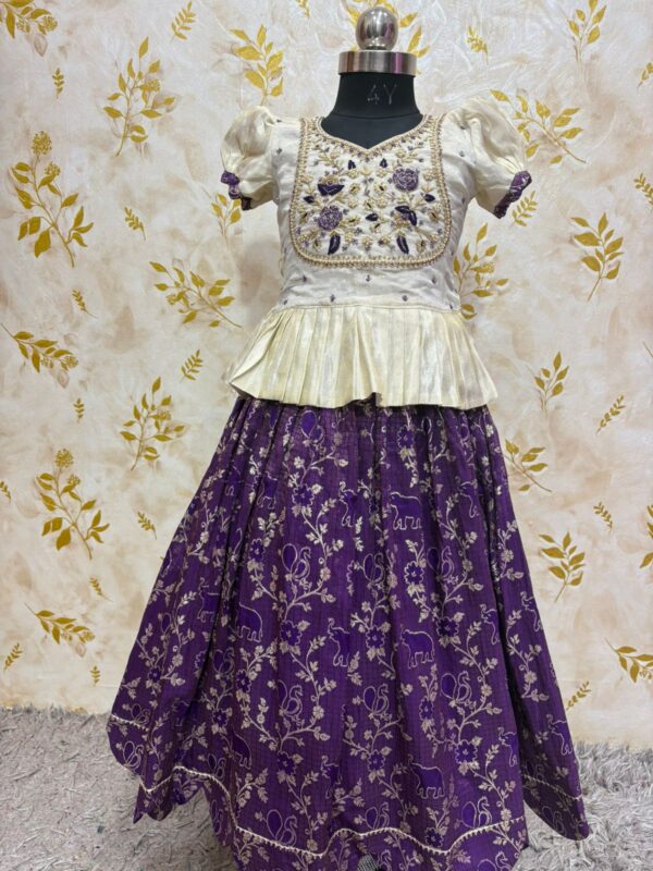 Soft tissue banaras lehenga paired with beautiful maggam work blouse