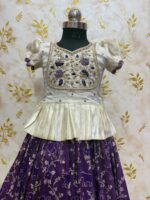 Soft tissue banaras lehenga paired with beautiful maggam work blouse