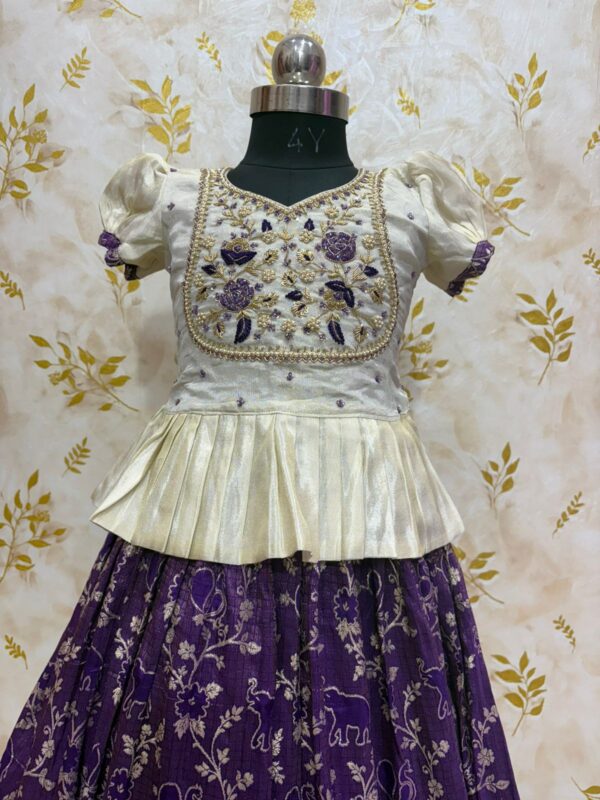 Soft tissue banaras lehenga paired with beautiful maggam work blouse