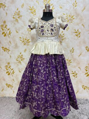 Soft tissue banaras lehenga paired with beautiful maggam work blouse