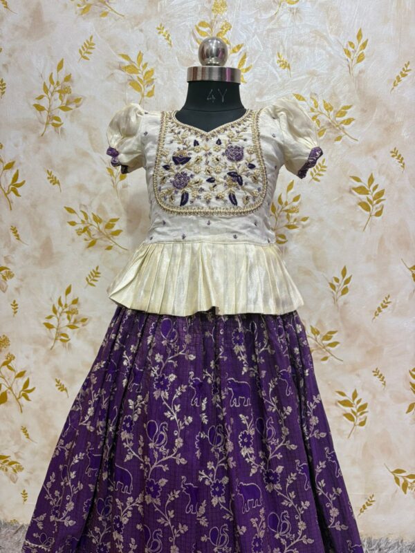 Soft tissue banaras lehenga paired with beautiful maggam work blouse
