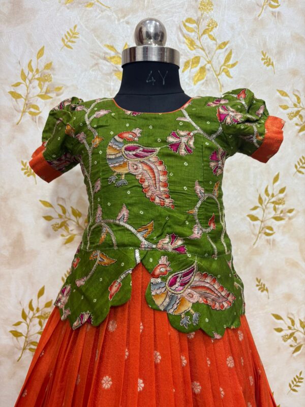 Zari kota kids lehenga paired with kalamkari blouse