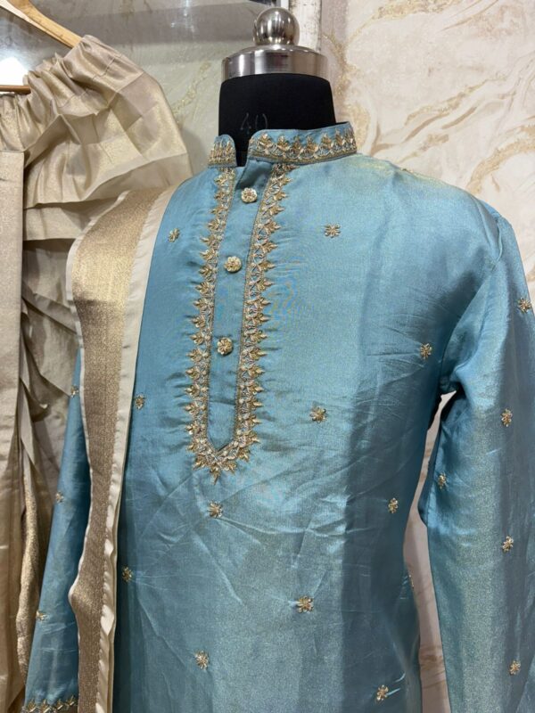 Soft tissue men's kurta with maggam work paired with dhoti & kanduva