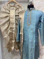 Soft tissue men's kurta with maggam work paired with dhoti & kanduva