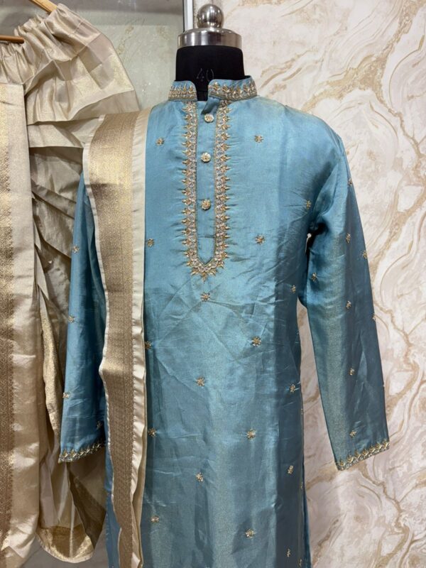 Soft tissue men's kurta with maggam work paired with dhoti & kanduva