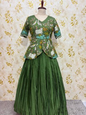 Embroidery work peplum top paired with crepe skirt with heavy flare