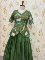 Embroidery work peplum top paired with crepe skirt with heavy flare