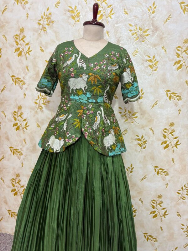 Embroidery work peplum top paired with crepe skirt with heavy flare