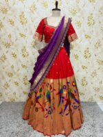 Red colour paithani lehenga paired with maggam work blouse paired with muniya dupatta