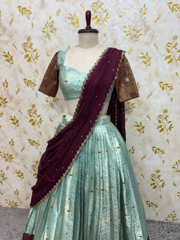 Kanchi lehenga with beautiful border paired with hand work chinnon dupatta
