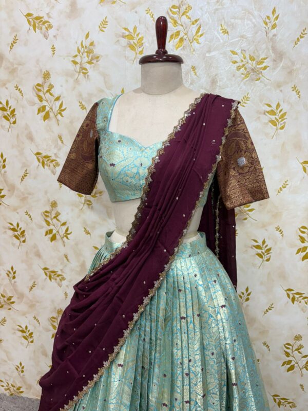 Kanchi lehenga with beautiful border paired with hand work chinnon dupatta