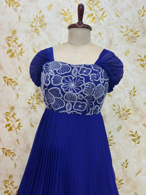 Dual shades long gown with beautiful pearl work on yoke part