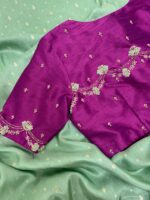 Munga crepe saree having all over zari motifs paired with beautiful maggam work blouse