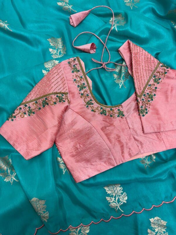 Munga crepe saree with beautiful motifs paired with maggam work blouse