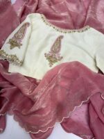 Tissue saree paired with maggam work blouse