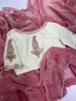 Tissue saree paired with maggam work blouse