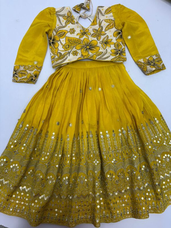 Designer kids tissue skirt having beautiful sequin work paired with floral blouse