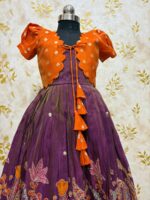 Tissue frock with sequin and embroidery work paired with beautiful tissue over coat