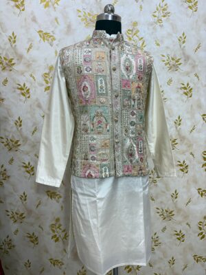Soft pattu kurta with pijama paired with beautiful sequin & embroidery work over coat