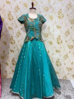 Triple design tissue skirt paired with heavy maggam work blouse