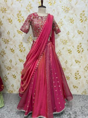 Triple design tissue skirt paired with heavy maggam work blouse paired with tissue dupatta