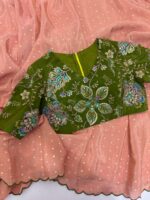 Tissue saree paired with embroidery blouse