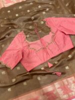 Soft tissue saree with beautiful border paired with pretty maggam work blouse