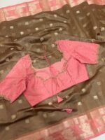 Soft tissue saree with beautiful border paired with pretty maggam work blouse