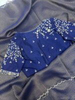 Pure tissue saree paired with beautiful maggam work blouse