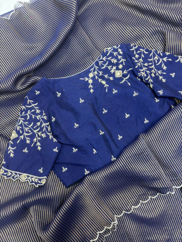 Pure tissue saree paired with beautiful maggam work blouse