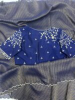 Pure tissue saree paired with beautiful maggam work blouse