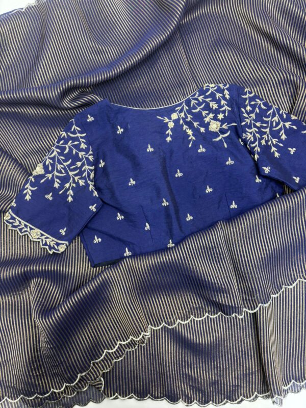 Pure tissue saree paired with beautiful maggam work blouse