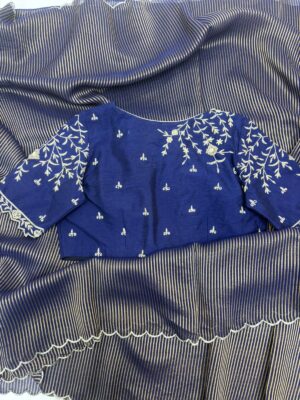 Pure tissue saree paired with beautiful maggam work blouse