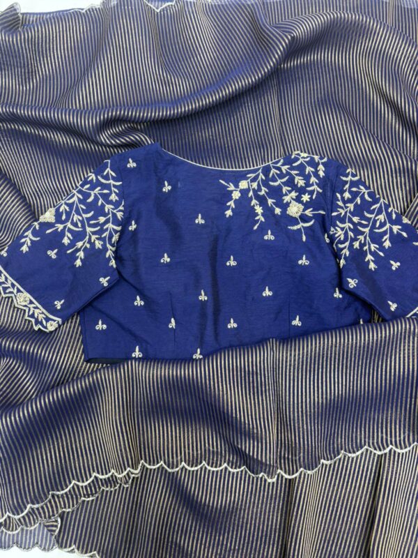 Pure tissue saree paired with beautiful maggam work blouse