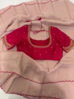 Pure tissue saree with scallop border paired with  maggam work blouse