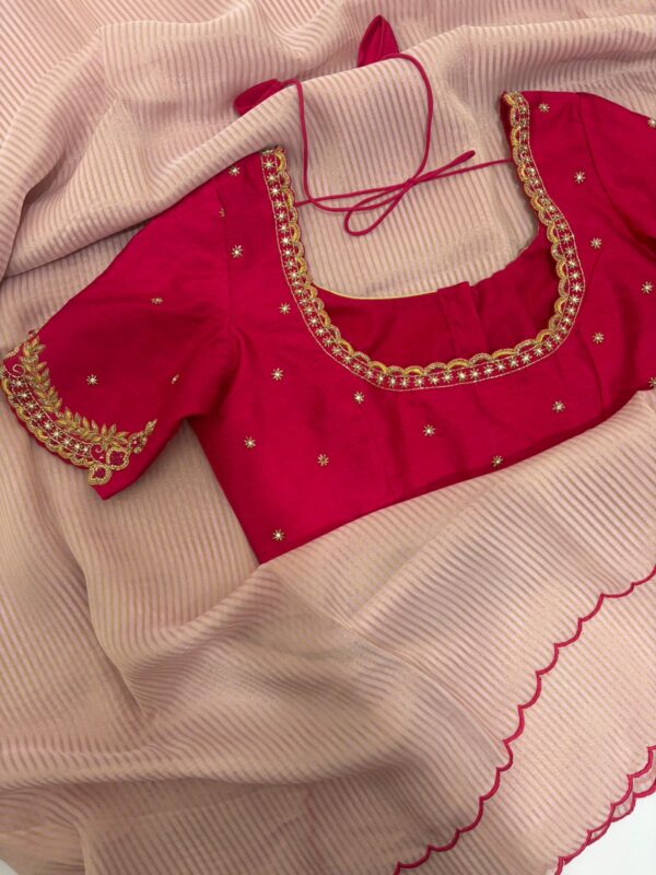 Pure tissue saree with scallop border paired with  maggam work blouse