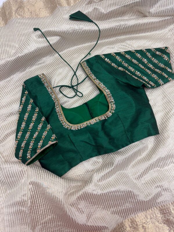 Tissue saree paired with beautiful maggam work blouse