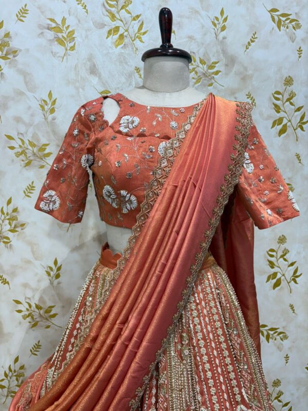 Pure tissue kali lehenga with heavy work paired with blouse and dupatta