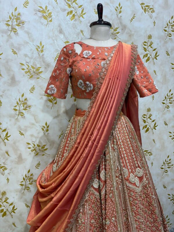 Pure tissue kali lehenga with heavy work paired with blouse and dupatta
