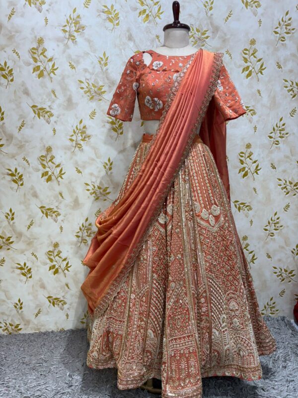 Pure tissue kali lehenga with heavy work paired with blouse and dupatta
