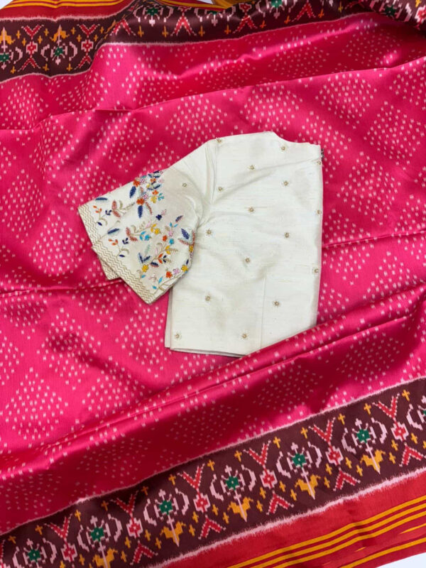 Patola saree paired with beautiful maggam work blouse
