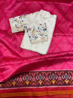 Patola saree paired with beautiful maggam work blouse