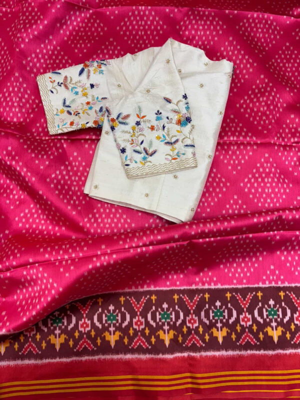 Patola saree paired with beautiful maggam work blouse
