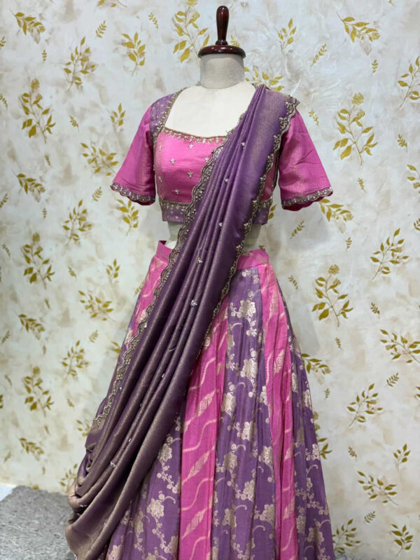 Tissue kali lehenga paired with beautiful maggam work blouse & dupatta