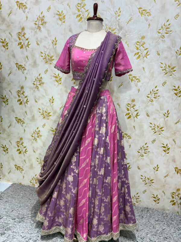 Tissue kali lehenga paired with beautiful maggam work blouse & dupatta