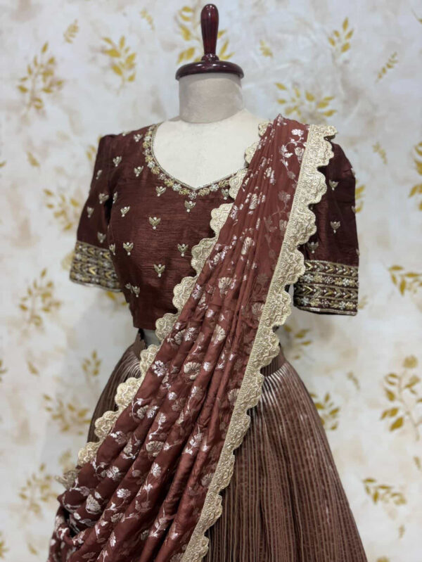 Pure tissue lehenga paired with heavy maggam work blouse & dupatta